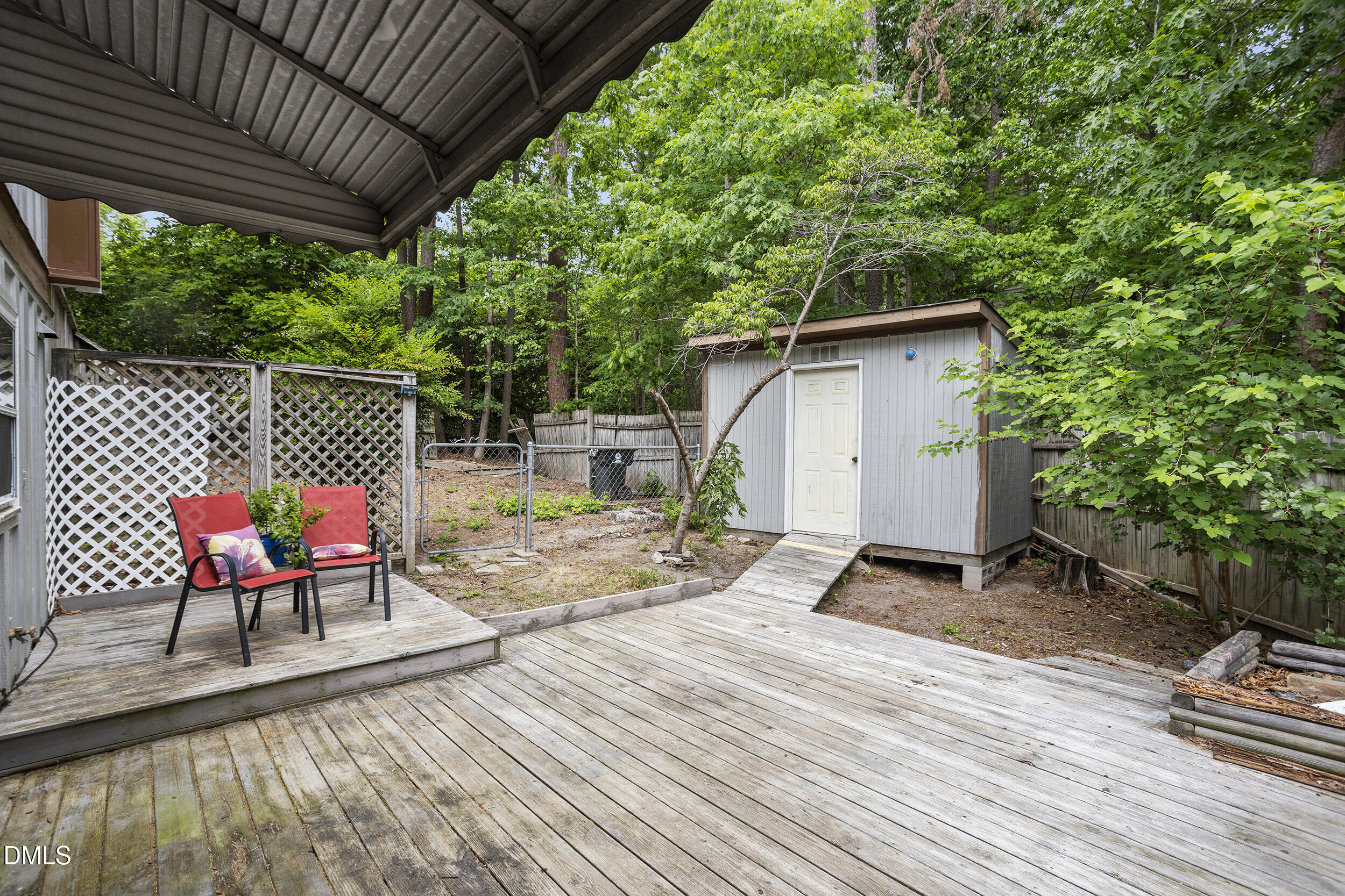 1801 Quail Ridge Road Raleigh, NC 27609 - Photo 29 of 29 a backyard of a house with seating space