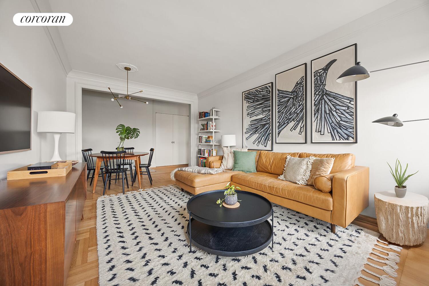 75 Prospect Park Southwest, Unit E8 Brooklyn, NY 11215 - Photo 3 of 11 a living room with furniture and a flat screen tv