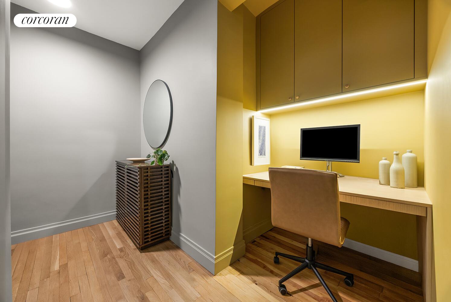 75 Prospect Park Southwest, Unit E8 Brooklyn, NY 11215 - Photo 4 of 11 a view of a workspace with furniture and a window