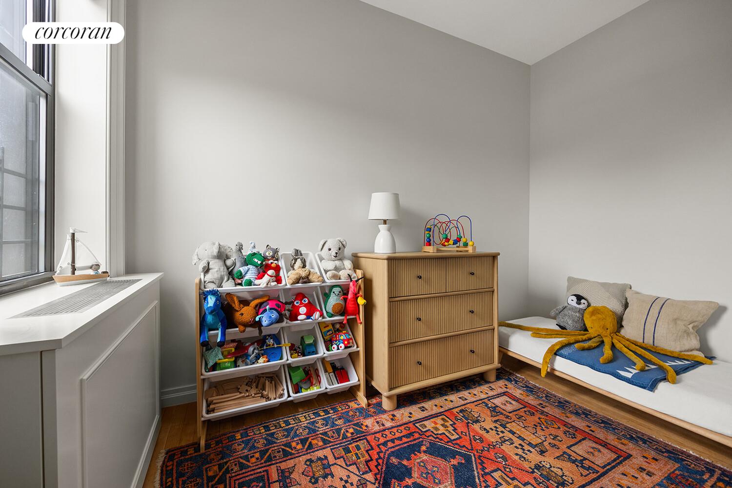 75 Prospect Park Southwest, Unit E8 Brooklyn, NY 11215 - Photo 8 of 11 a room with storage and utility