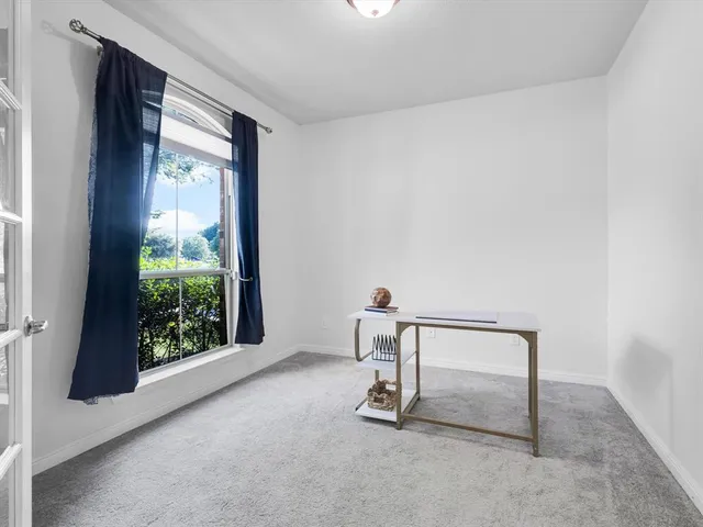 a view of a room with a window