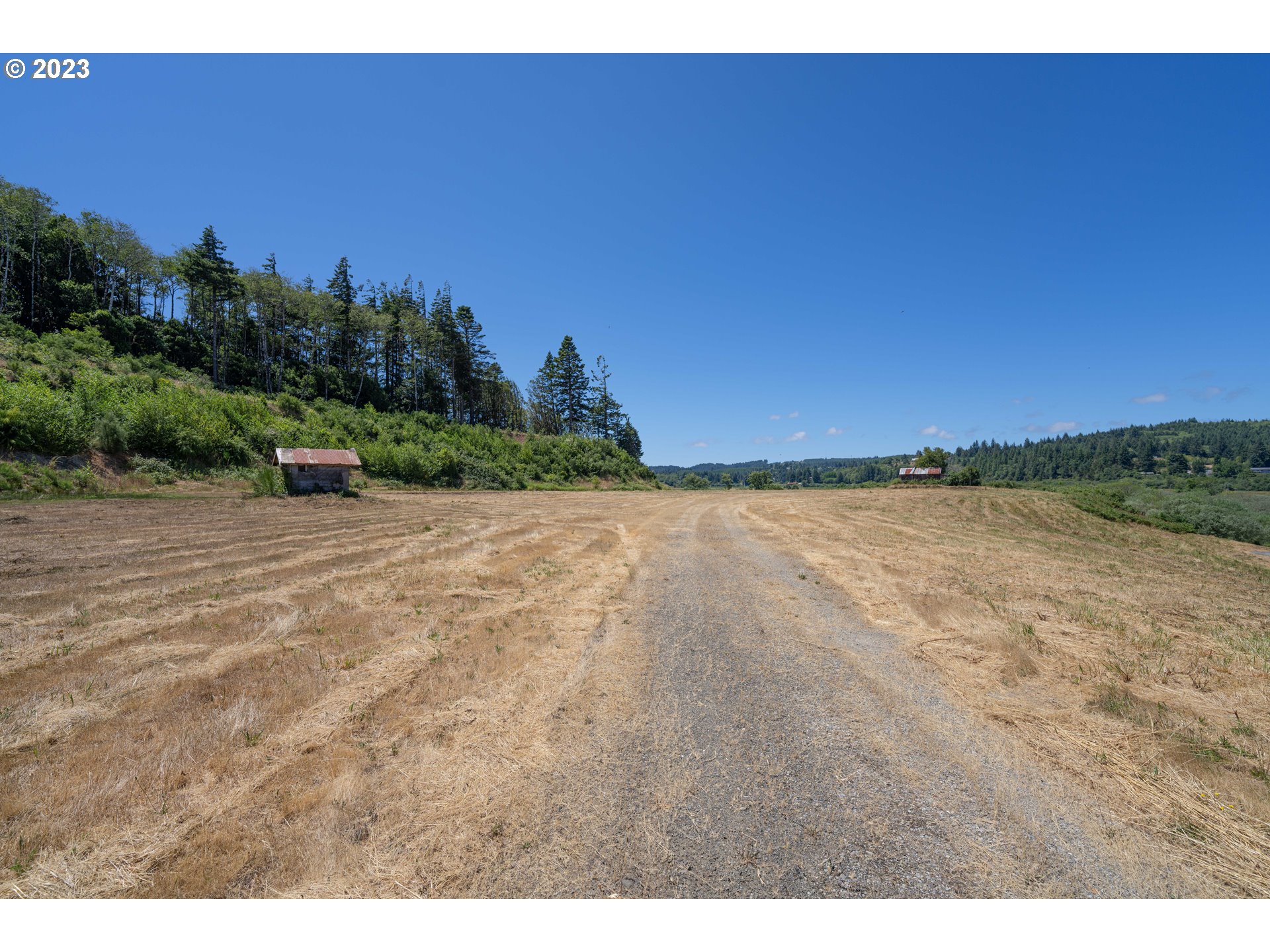 North Bank Lane Coquille, OR 97423 - Photo 3 of 6 a view of an outdoor space and a yard