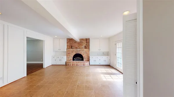 a view of a livingroom with a fireplace