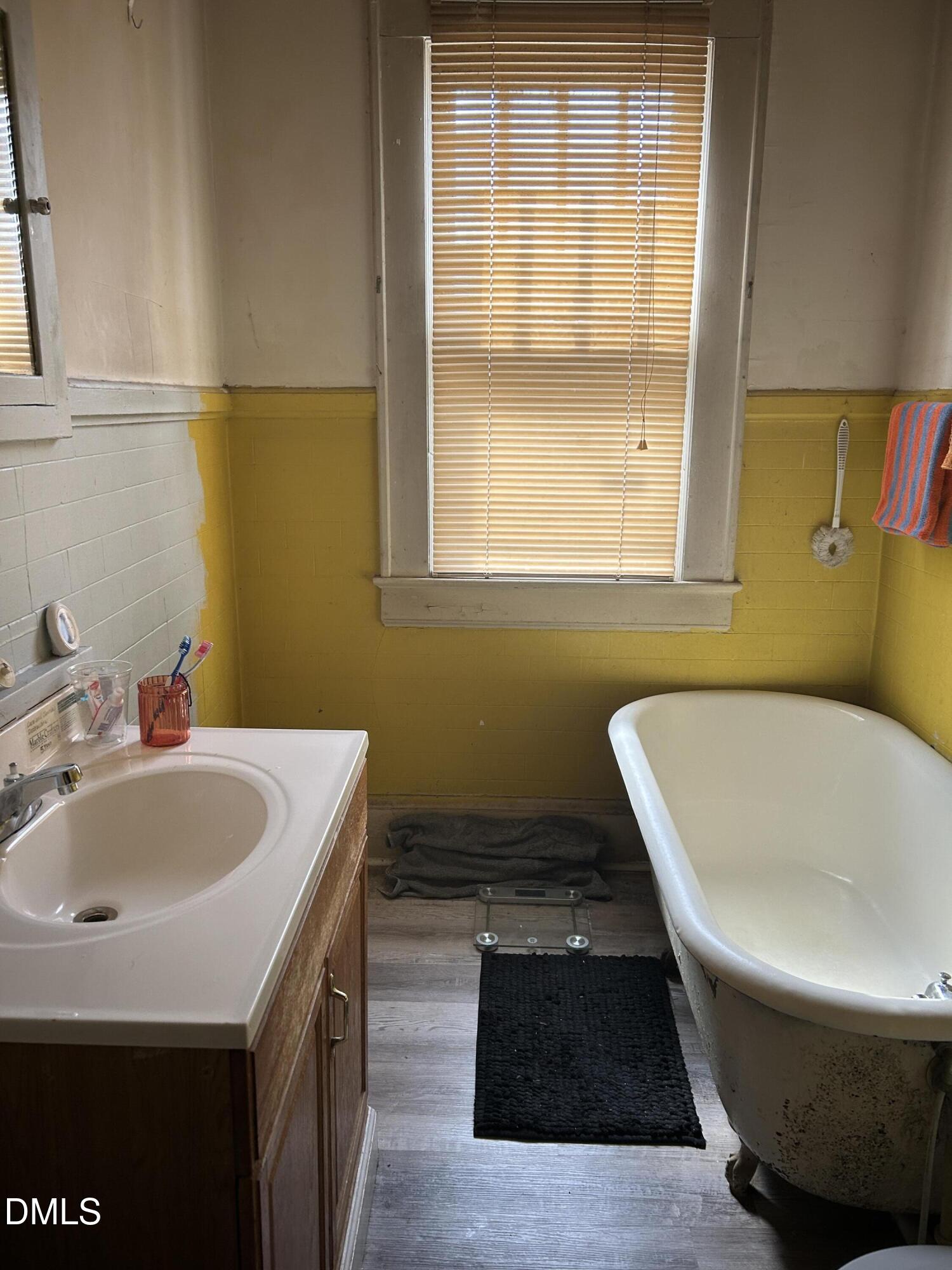 910 Chester Street Durham, NC 27701 - Photo 5 of 9 a bathroom with a sink and a bathtub