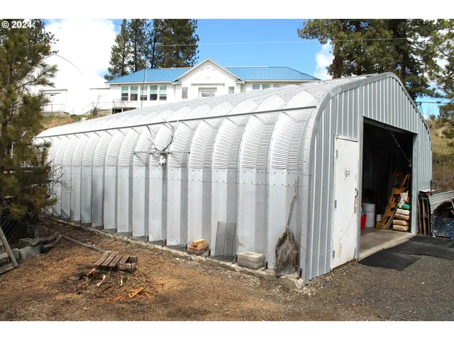 a white house with a outdoor space