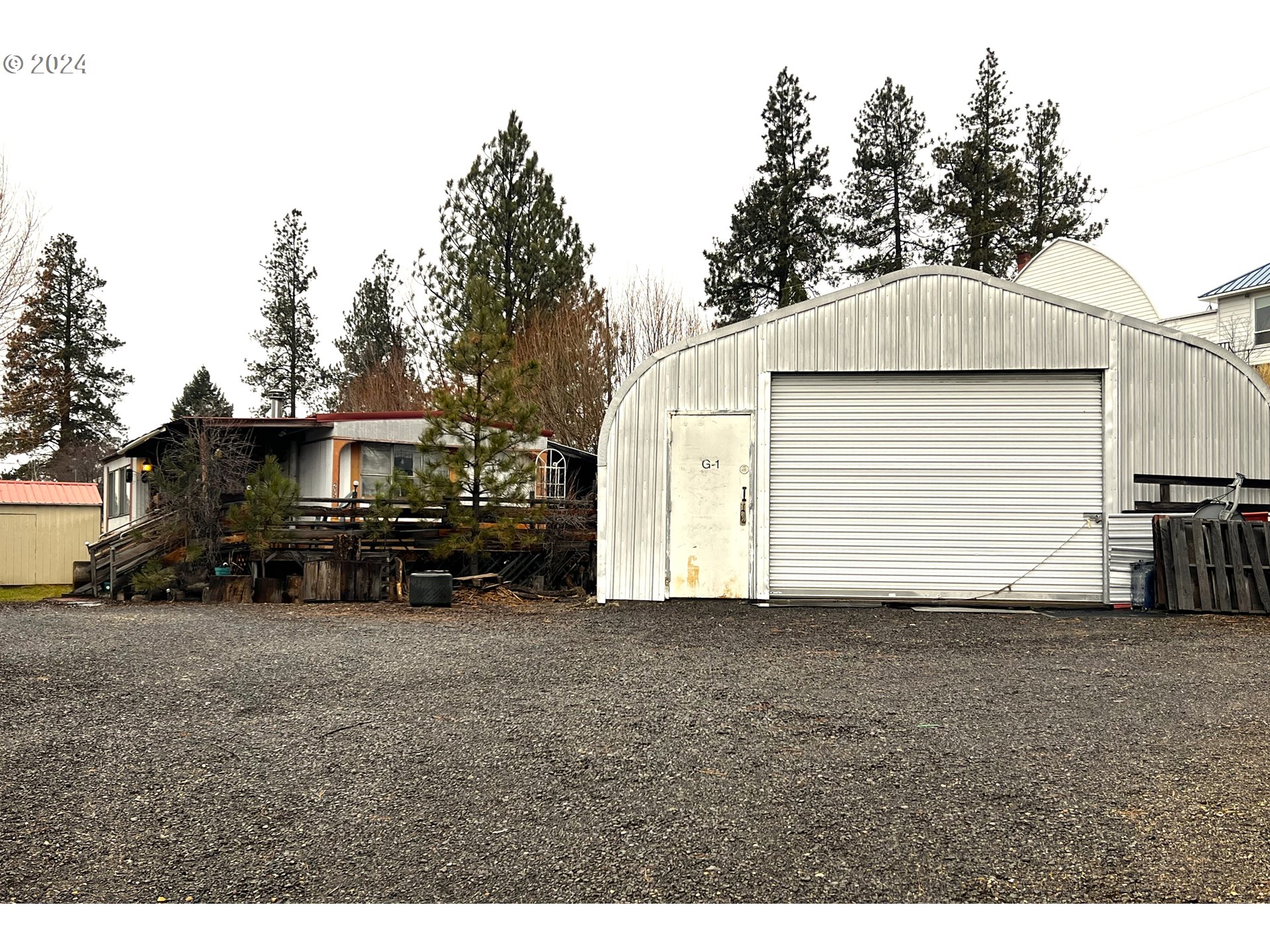205 Camas Street Ukiah, OR 97880 - Photo 2 of 41 a view of a house with a yard
