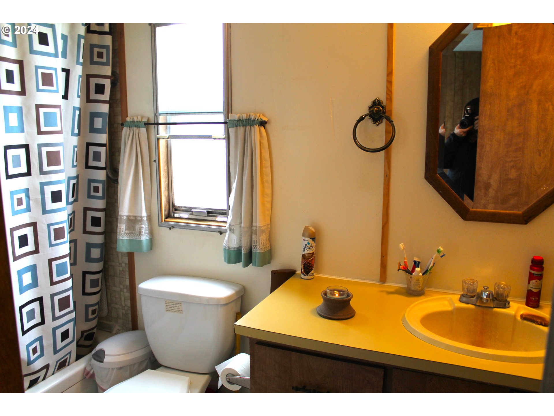205 Camas Street Ukiah, OR 97880 - Photo 25 of 41 a bathroom with a sink and a mirror