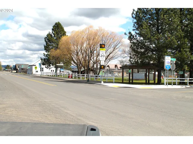 a view of a building with a road