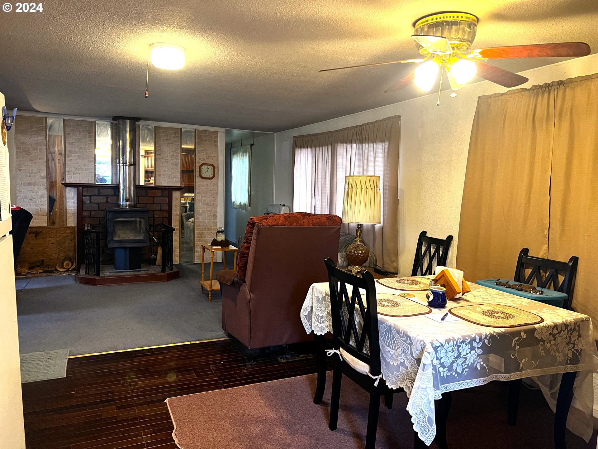 205 Camas Street Ukiah, OR 97880 - Photo 5 of 41 a dining room with furniture and window