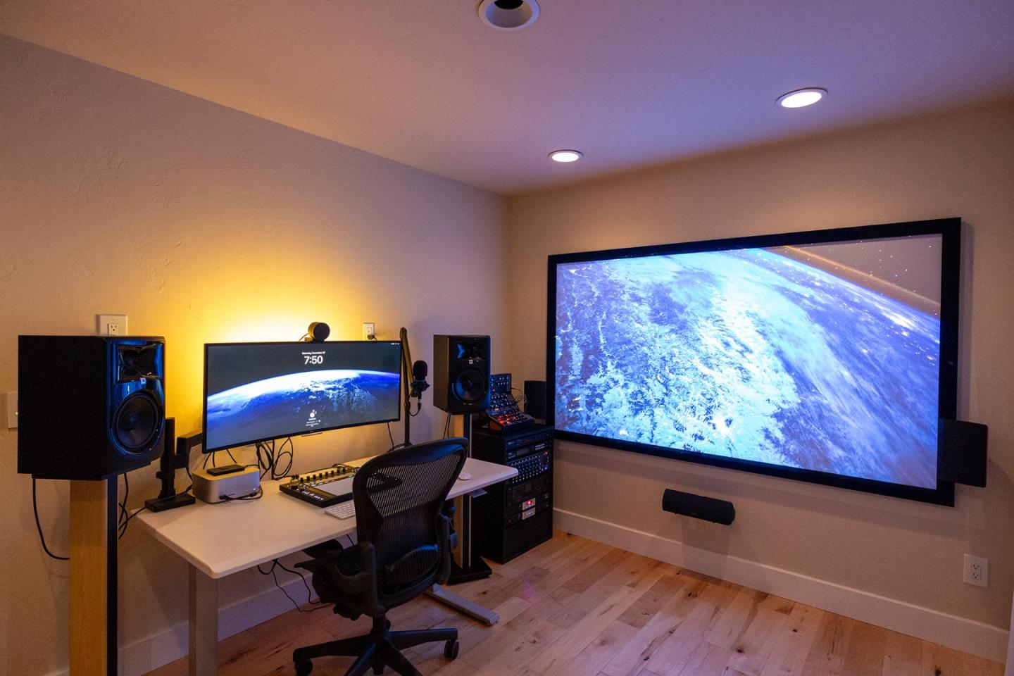 779 Alice Street Monterey, CA 93940 - Photo 20 of 27 a view of a workspace with furniture and screen tv