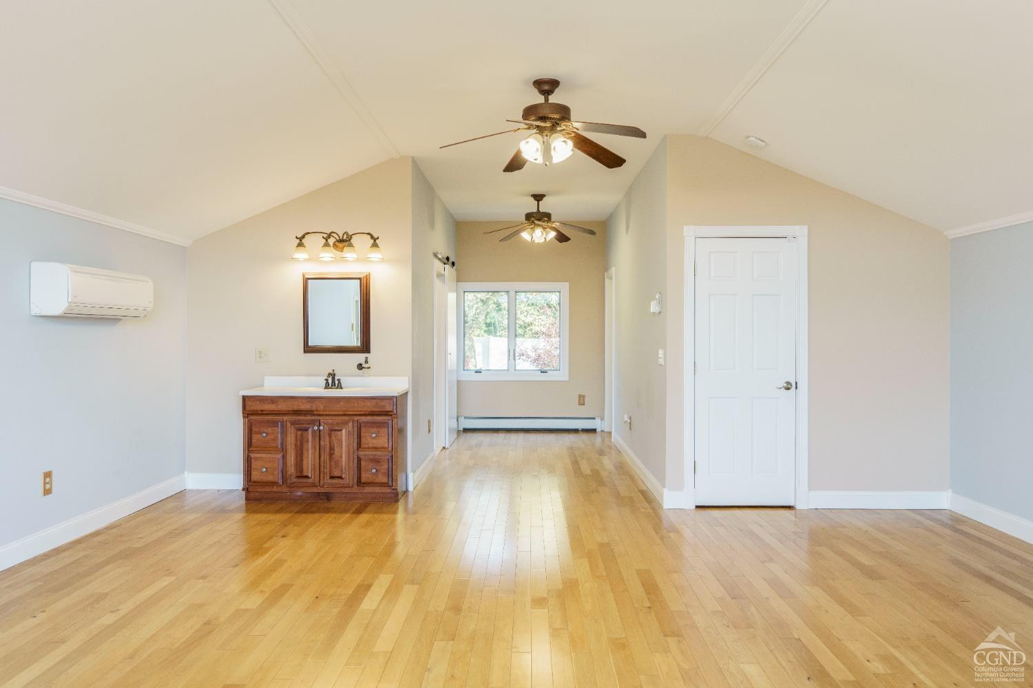 38 Cheviot Road, Unit 8 Germantown, NY 12526 - Photo 21 of 28 a view of a big room with wooden floor windows and chandelier fan