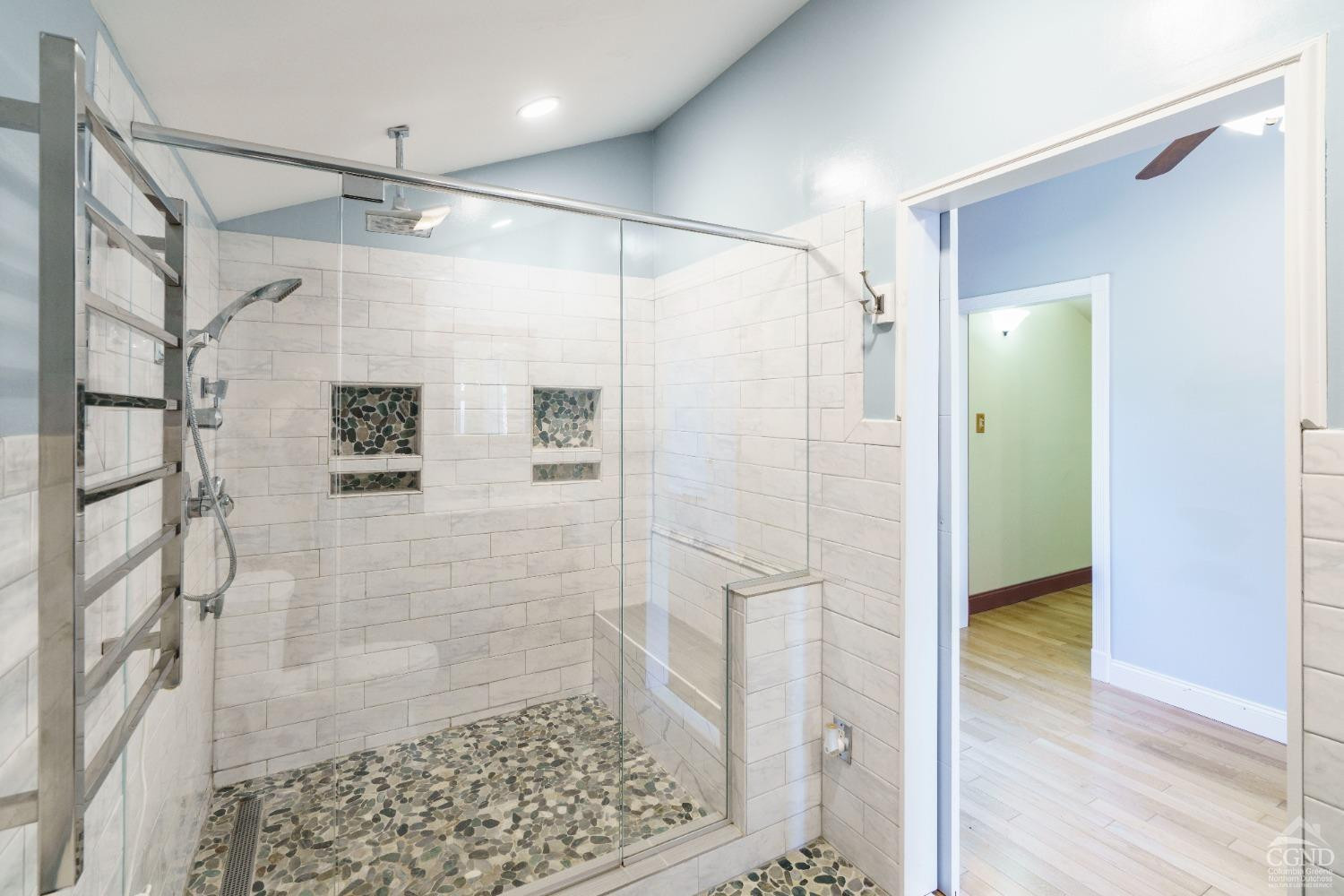 38 Cheviot Road, Unit 8 Germantown, NY 12526 - Photo 23 of 28 a bathroom with a glass shower door