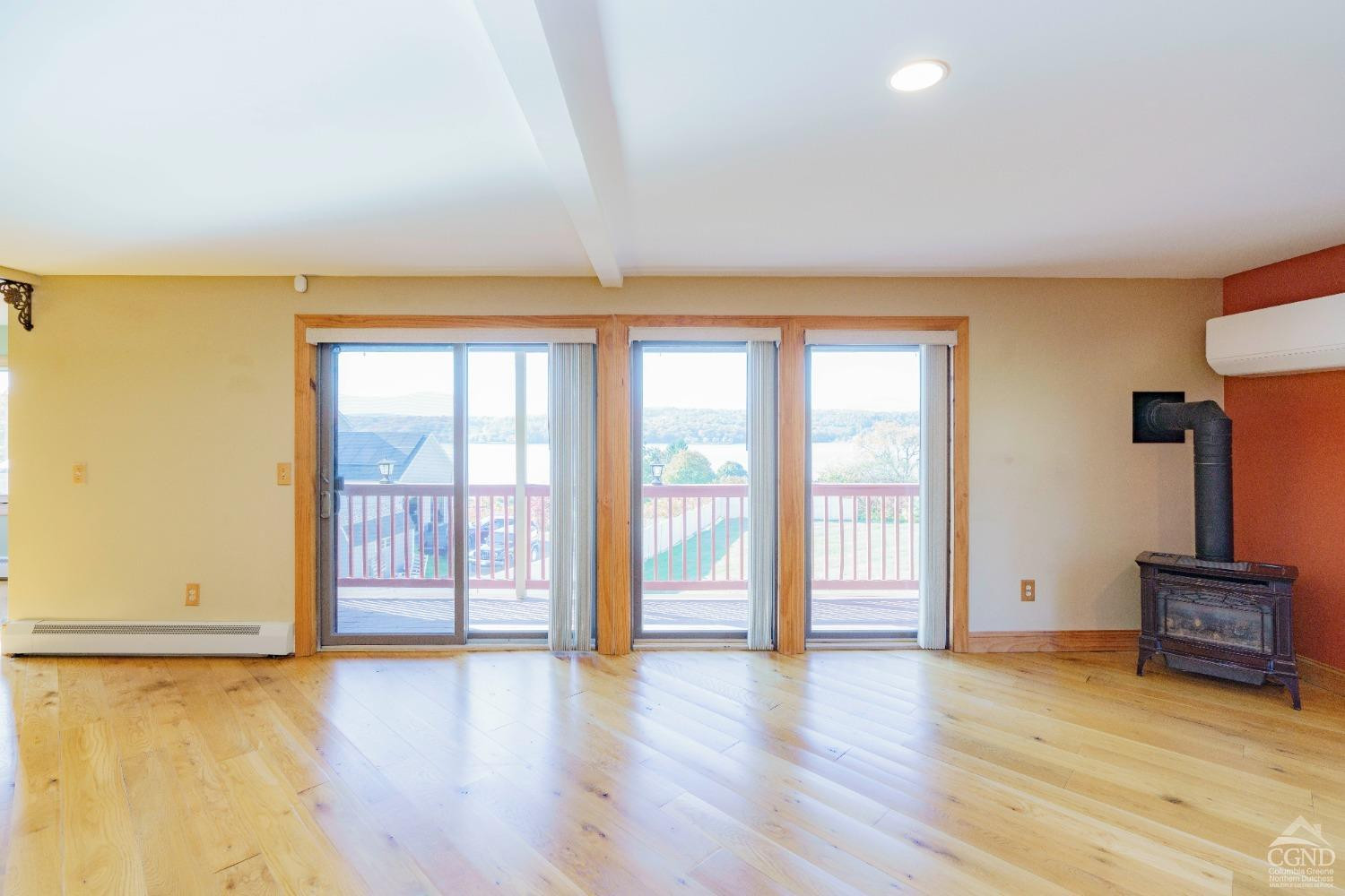 38 Cheviot Road, Unit 8 Germantown, NY 12526 - Photo 10 of 28 wooden floor in an empty room with a window