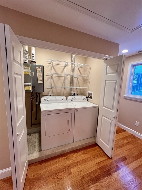 31 Rand Street, Unit 2 Revere, MA 02151 - Photo 14 of 15 a room with a sink wooden floor and utility