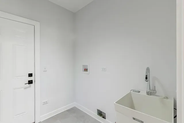 a view of an empty room with a large window