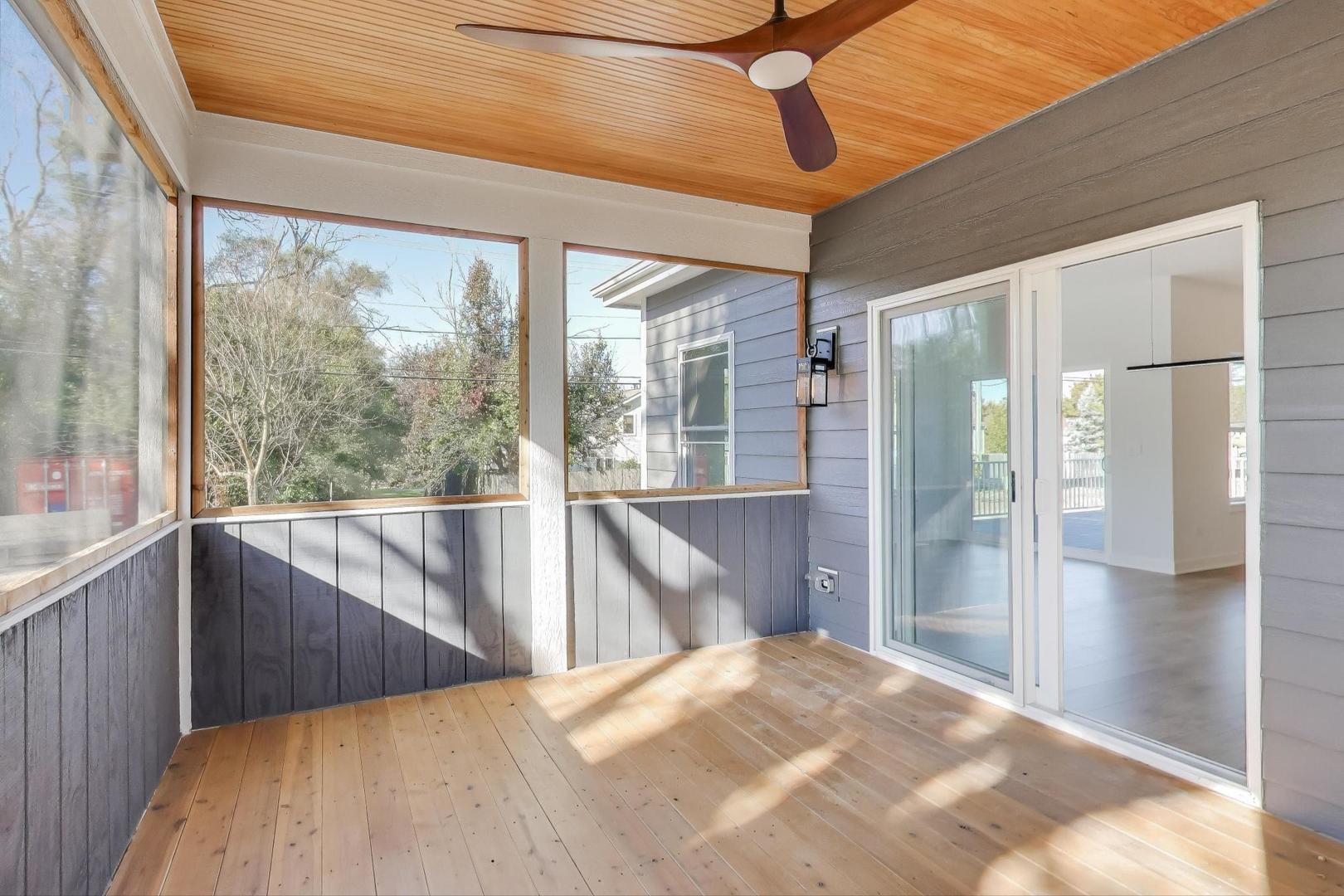 894 North Quentin Road Palatine, IL 60067 - Photo 24 of 29 a bedroom with a bed and a large window
