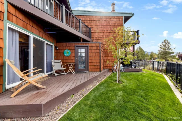 a view of a chairs on the roof deck