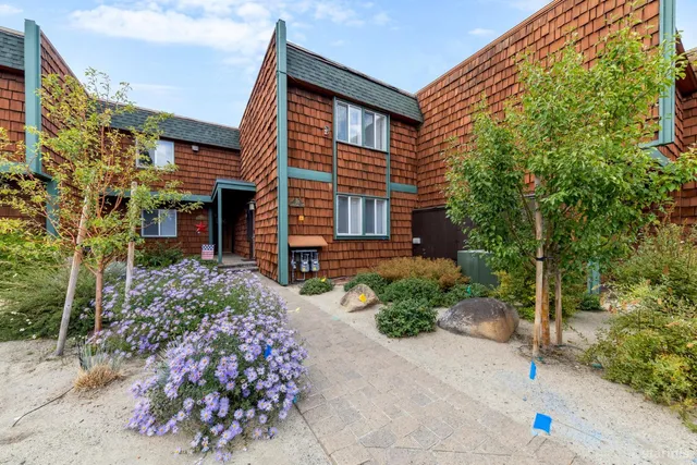 a view of a city with mountains in the background