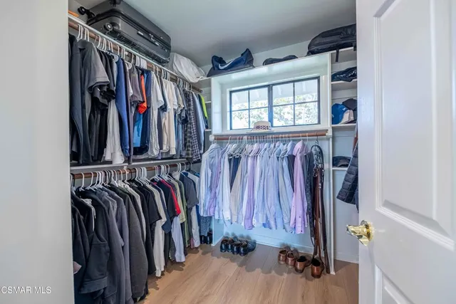a view of a chairs and table in the patio