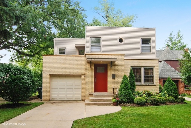 517 Berkeley Road Riverside, IL 60546 - Photo 1 of 15 front view of a house with a yard