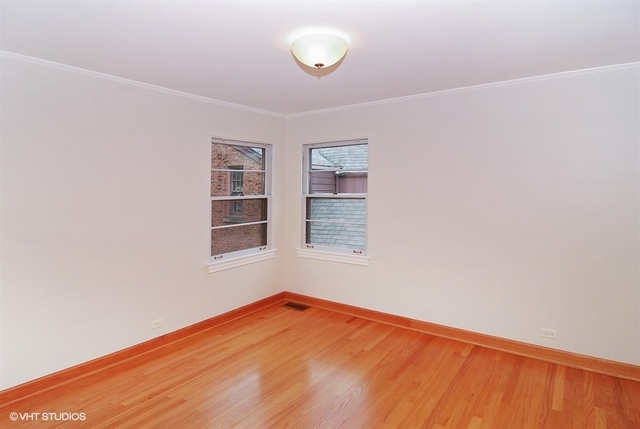 517 Berkeley Road Riverside, IL 60546 - Photo 10 of 15 an empty room with a window