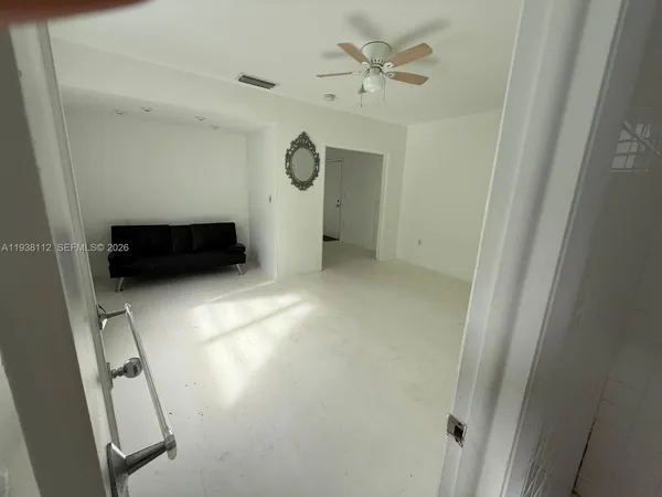 a view of a livingroom with a furniture