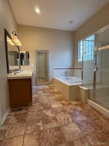 a kitchen with stainless steel appliances a sink and cabinets