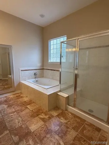 a bathroom with a sink and a shower
