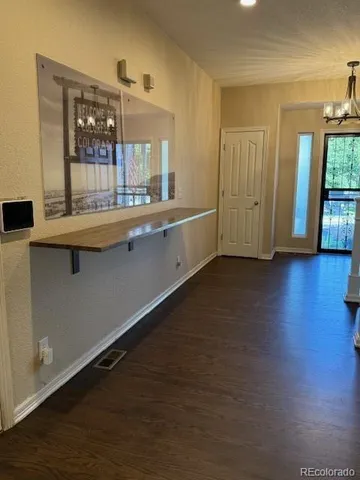 a large bathroom with a sink and mirror
