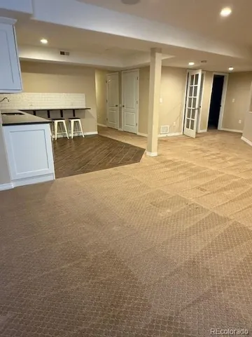 a view of a livingroom with furniture