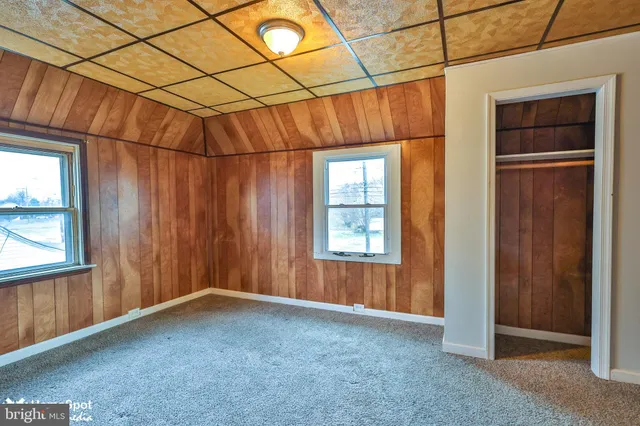 an empty room with windows