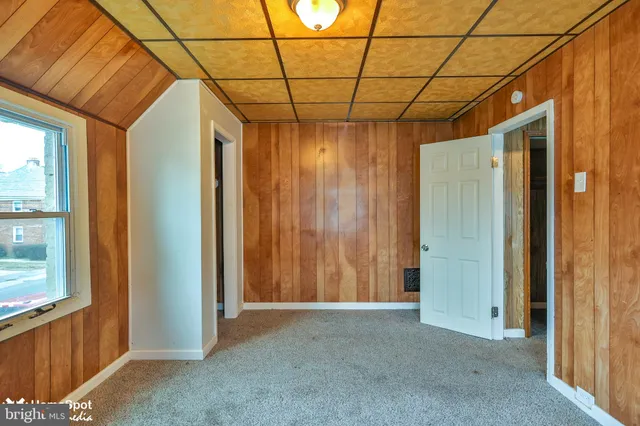 a view of a room with a large window