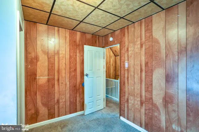 a view of a bathroom with a shower and a tub