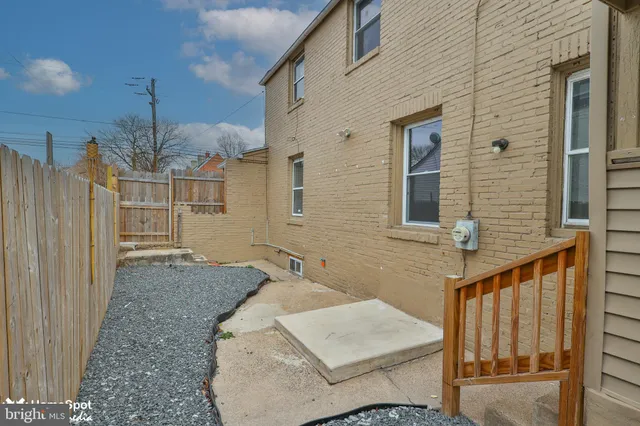 a bathroom with a sink a mirror and shower