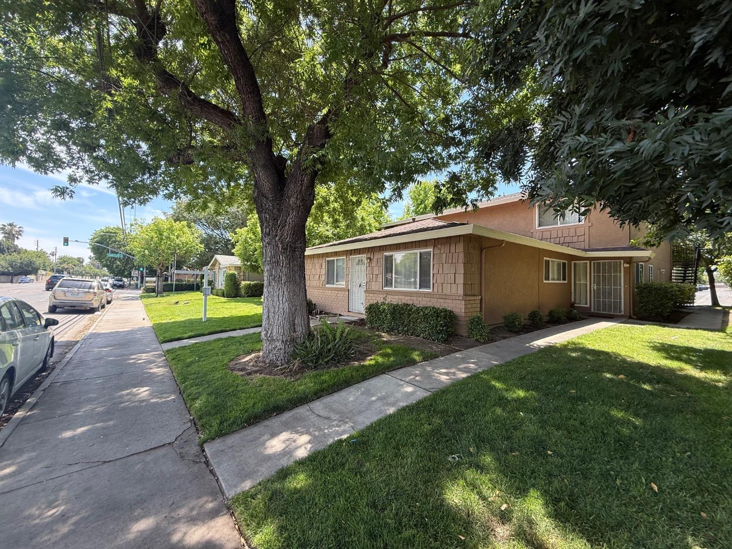 2505 Prescott Road, Unit 1 Modesto, CA 95350 - Photo 3 of 42 a front view of a house with garden