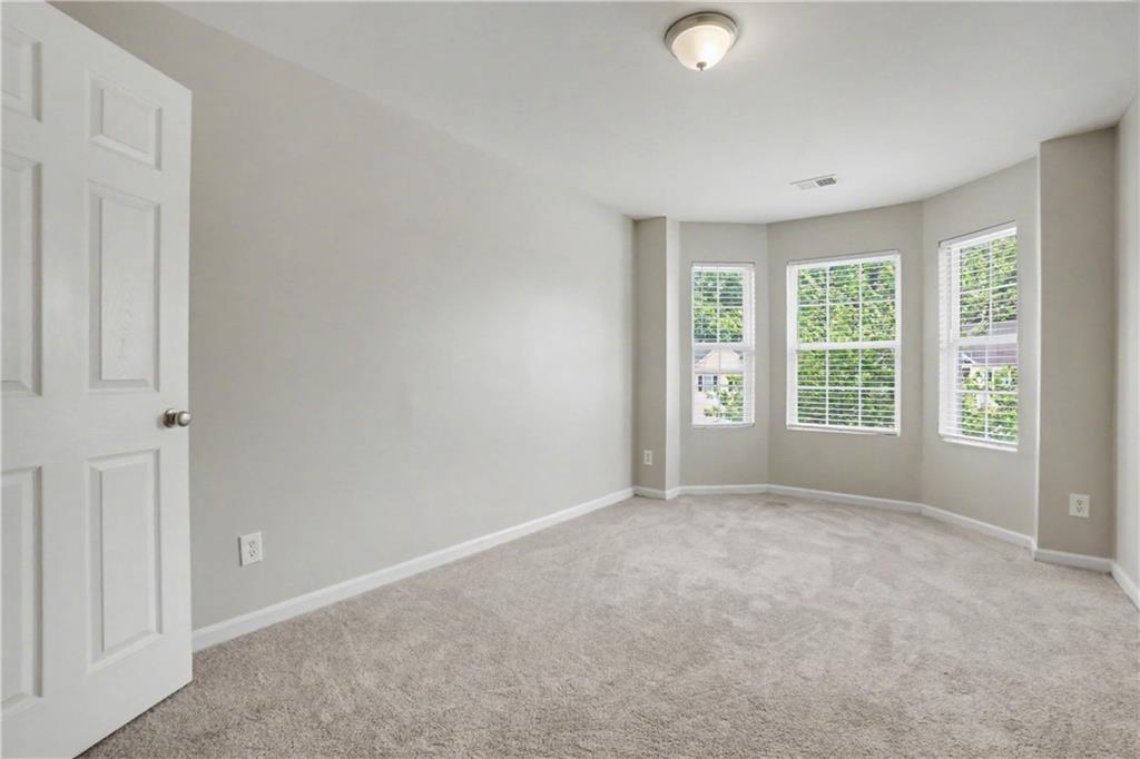 375 Walton View Fairburn, GA 30213 - Photo 19 of 38 a view of an empty room with a window