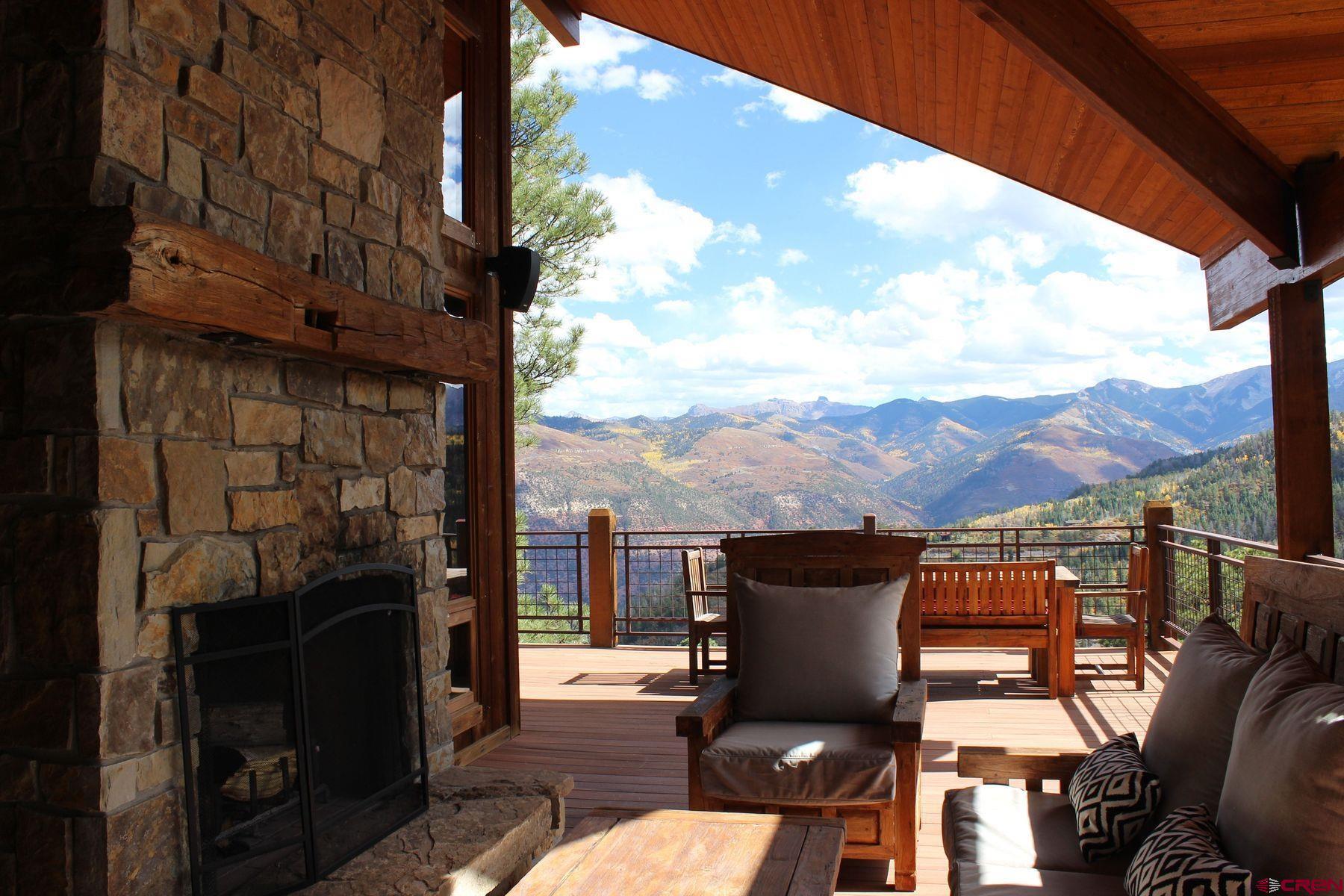 178 Valley View Road Ridgway, CO 81432 - Photo 13 of 45 a view of a chairs and a table in the balcony