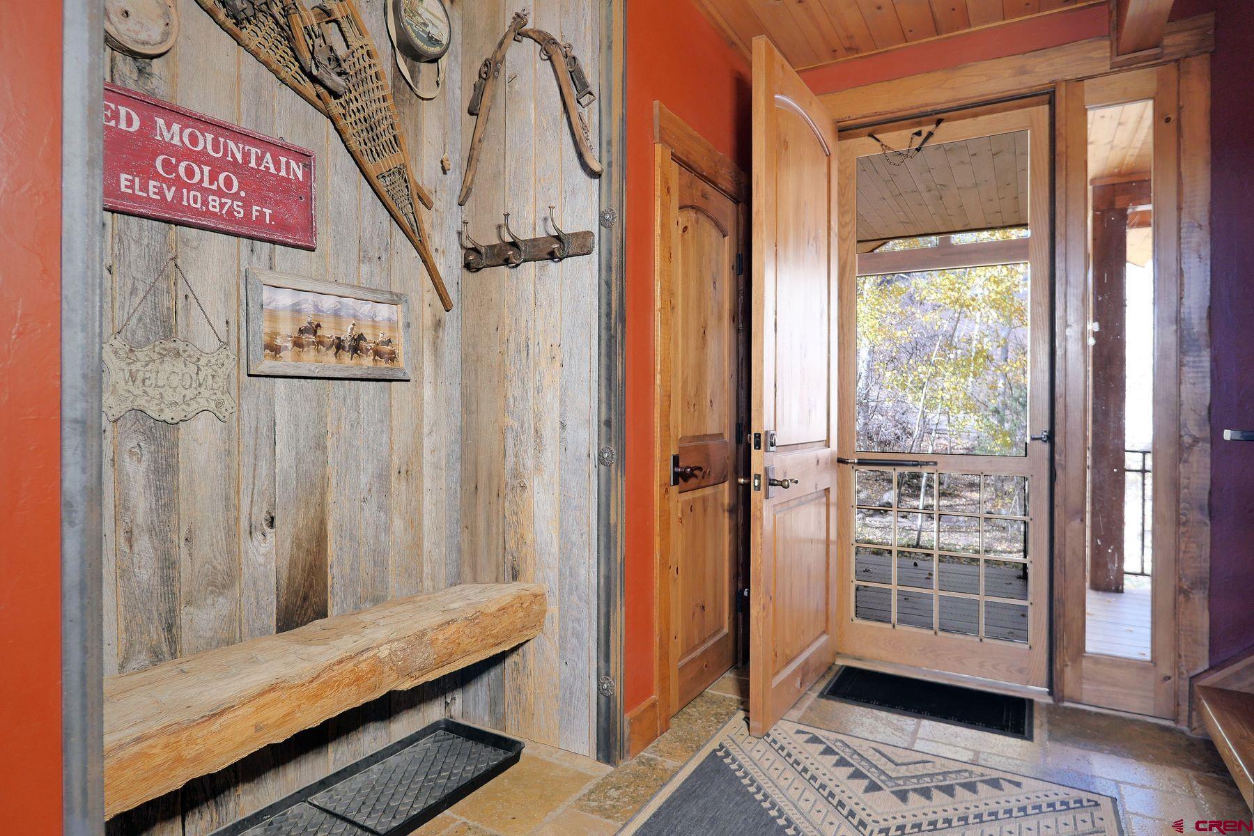 178 Valley View Road Ridgway, CO 81432 - Photo 16 of 45 a view of front door with furniture and a window