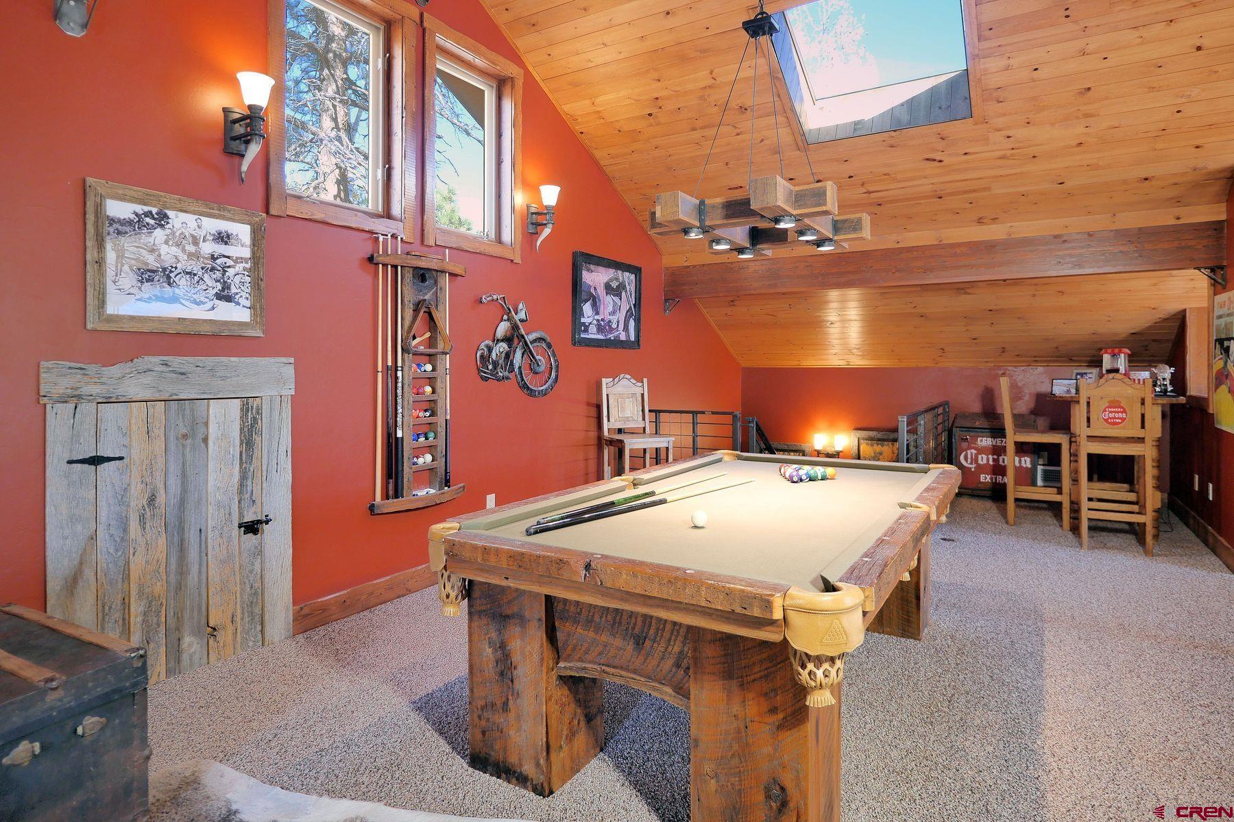 178 Valley View Road Ridgway, CO 81432 - Photo 17 of 45 a utility room with multiple dryer and chairs