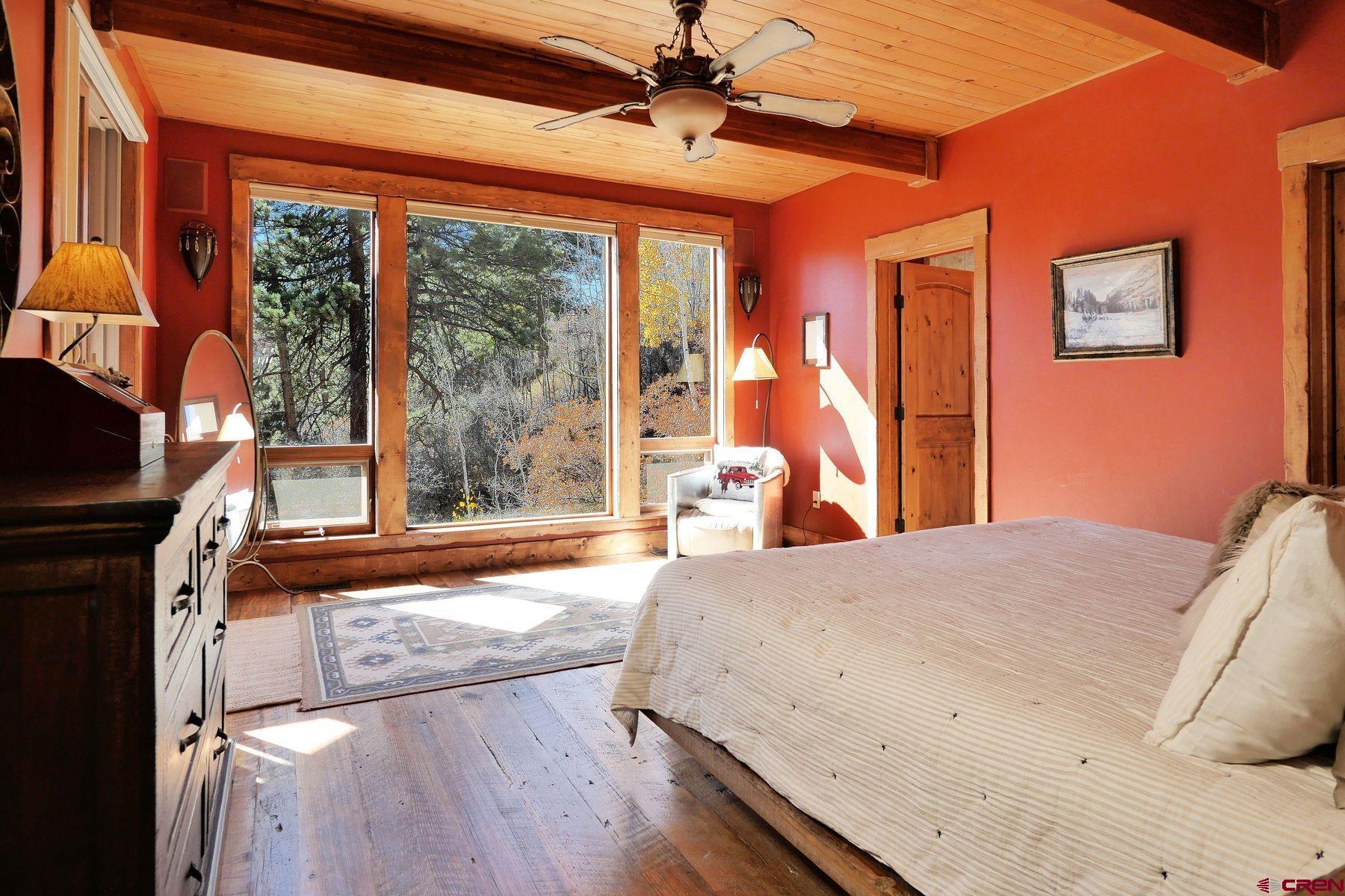 178 Valley View Road Ridgway, CO 81432 - Photo 18 of 45 a bedroom with a bed and a window