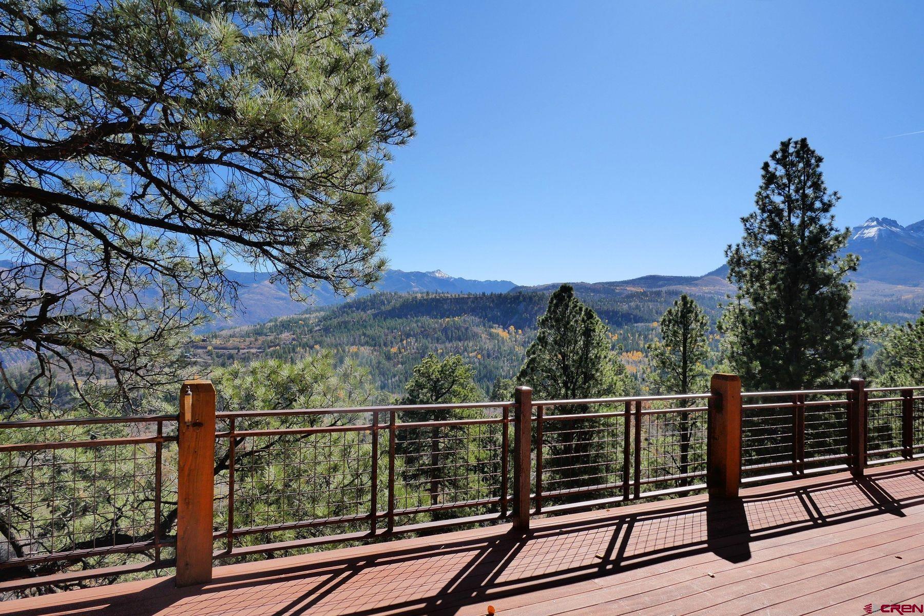 178 Valley View Road Ridgway, CO 81432 - Photo 2 of 45 a view of a balcony with wooden floor and fence