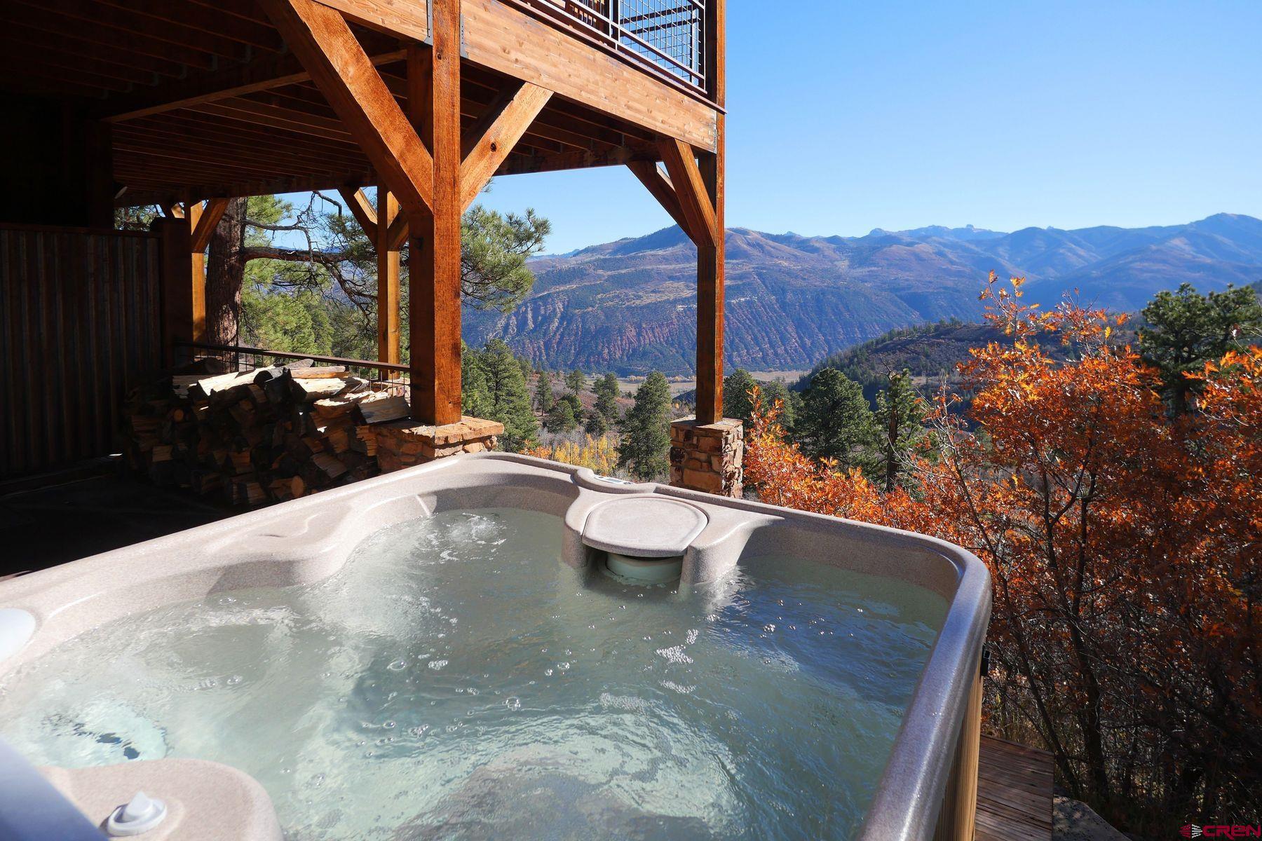 178 Valley View Road Ridgway, CO 81432 - Photo 25 of 45 a view of balcony with a patio and a garden
