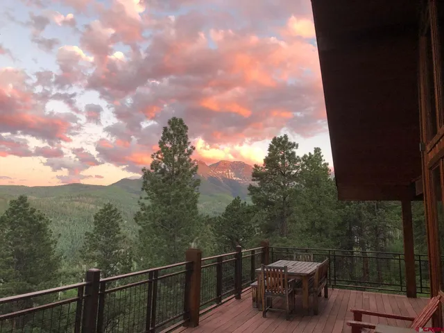 a view of a roof deck with couches