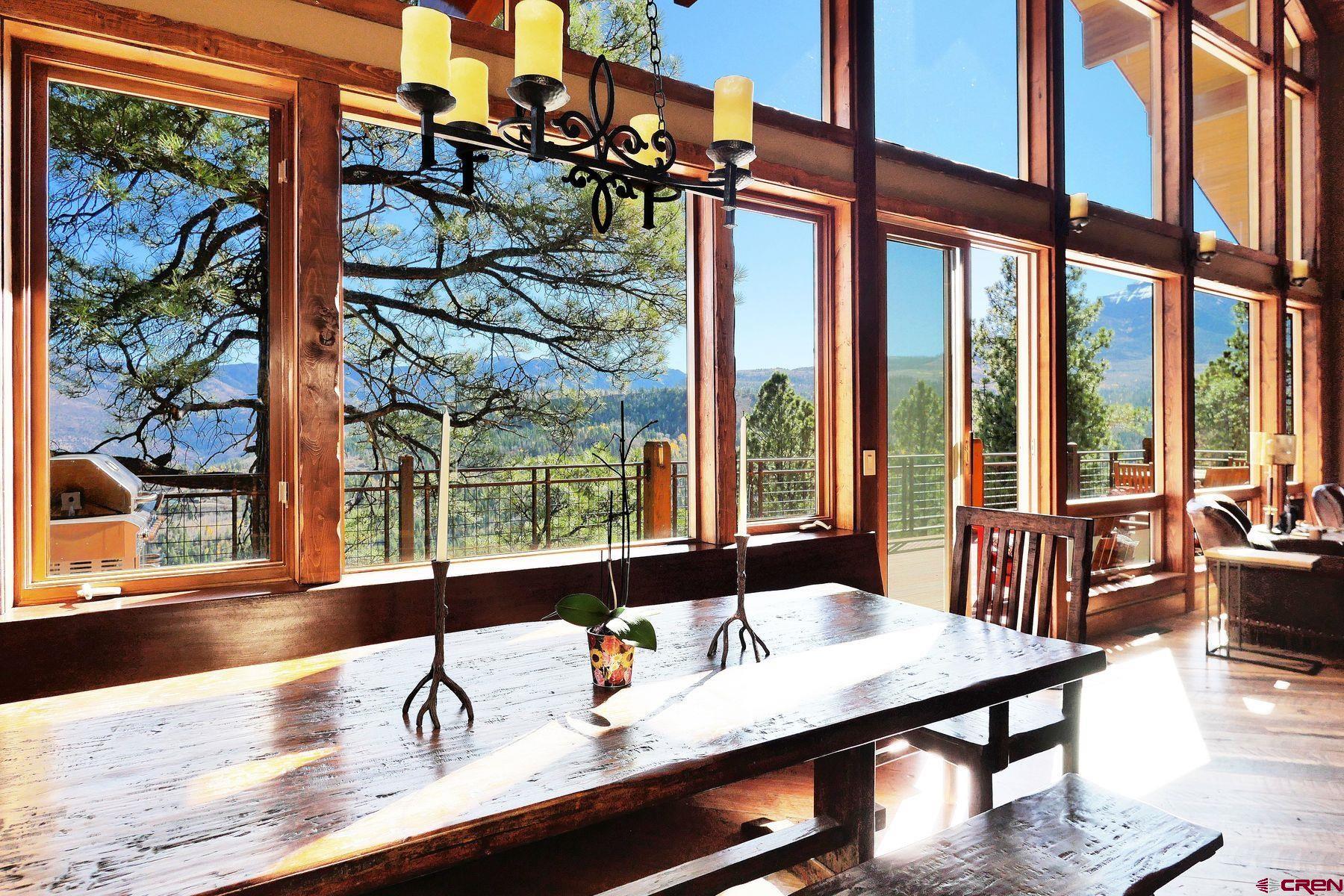178 Valley View Road Ridgway, CO 81432 - Photo 9 of 45 a view of a dining room with furniture window and outside view