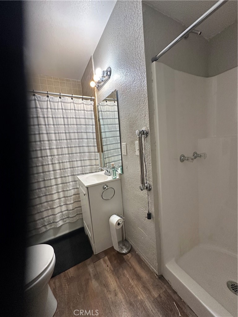 404 Sievers Avenue Brea, CA 92821 - Photo 11 of 21 a bathroom with a toilet and shower