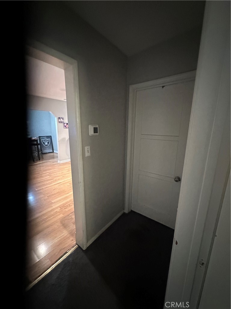 404 Sievers Avenue Brea, CA 92821 - Photo 13 of 21 a view of a hallway view with wooden floor and a living room