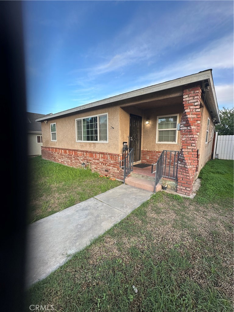 404 Sievers Avenue Brea, CA 92821 - Photo 3 of 21 a house view with a garden space