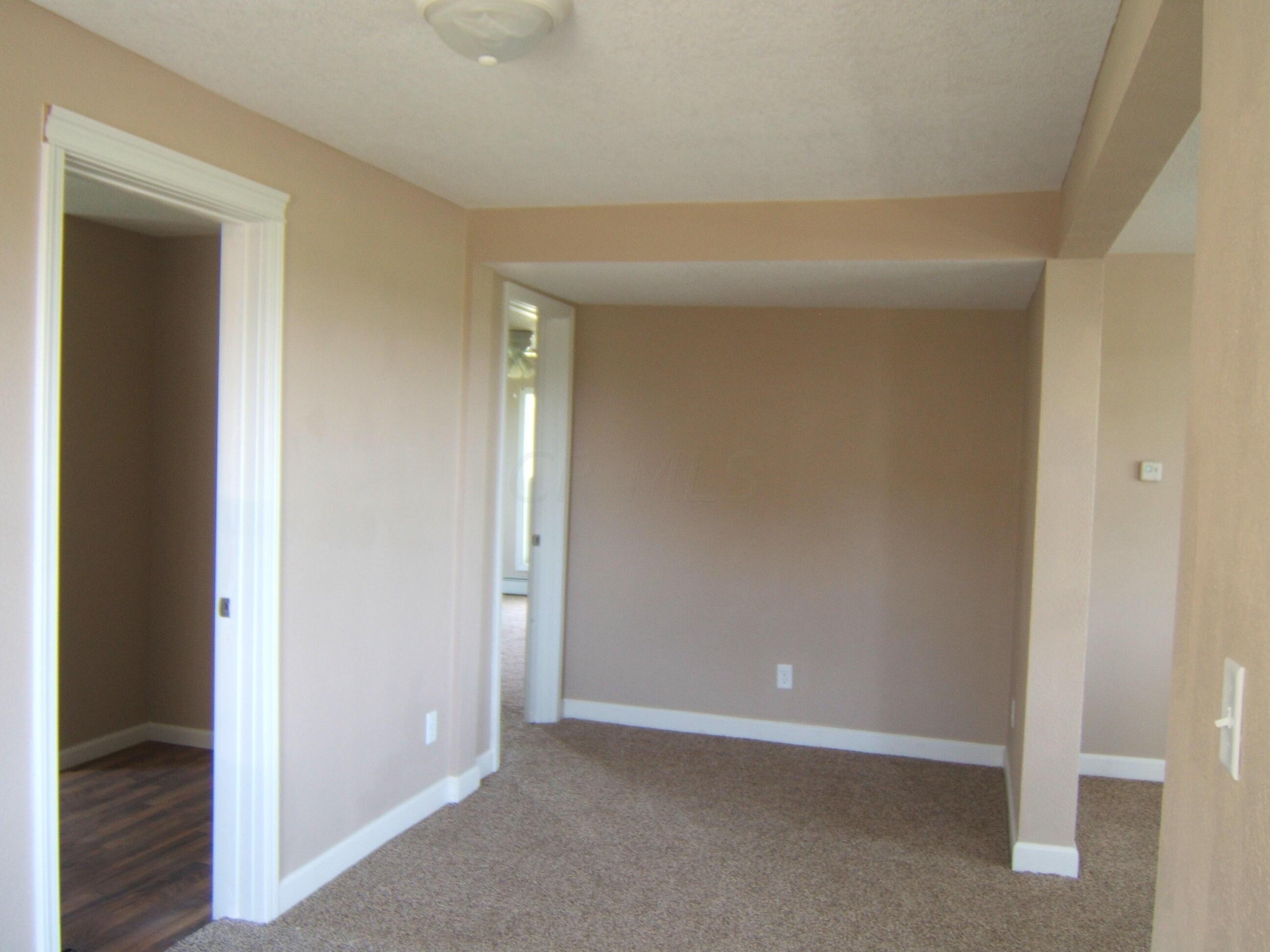 L799 Co Road Grelton, OH 43523 - Photo 8 of 25 Living room view to owner's bedroom doorway