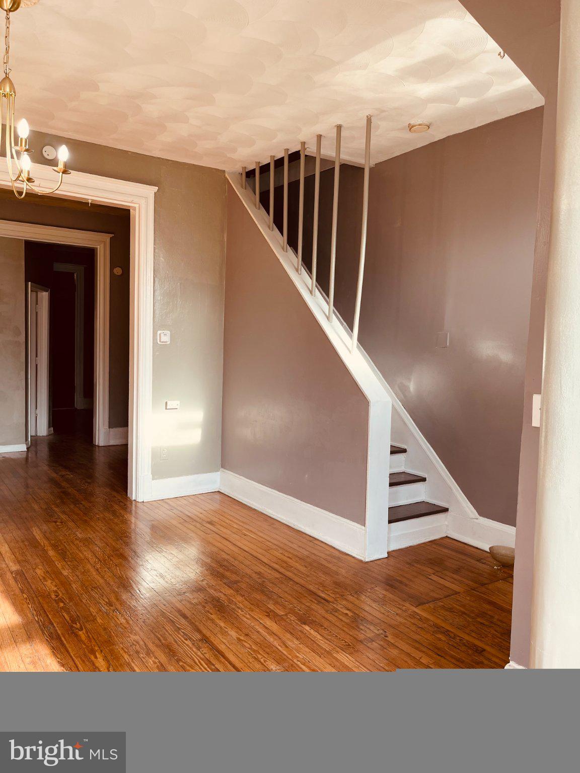 1841 North Capitol Street Northeast Washington, DC 20002 - Photo 6 of 6 Inviting entryway with elegant staircase.