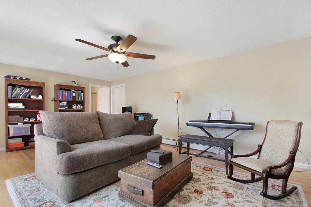 3 Jade Street Methuen, MA 01844 - Photo 18 of 35 a living room with furniture and a rug